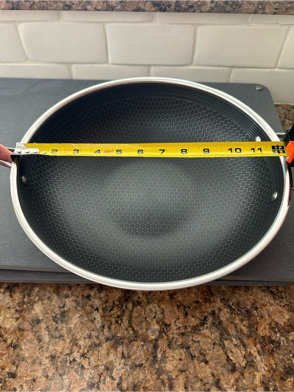 Hexclad 12 inch hybrid Non Black Nonstick Frying Pan with Honeycomb Surface.
